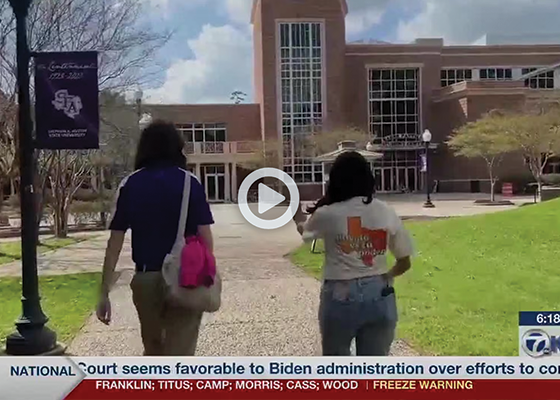 Video thumbnail of two women walk towards an academic building.